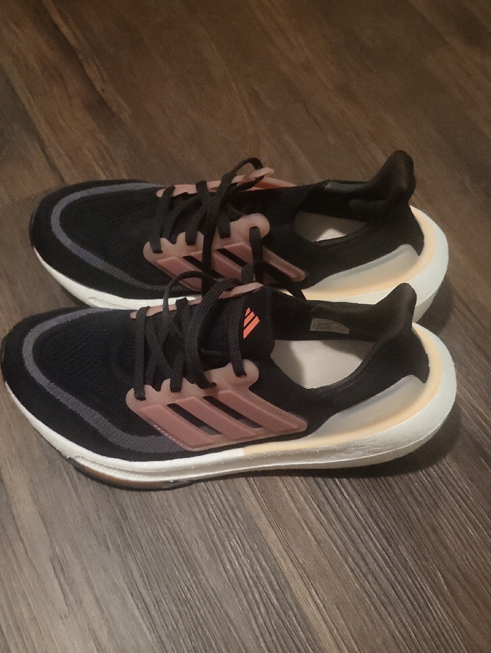 Womens adidas Ultraboost Black Sneakers with Pink Accents and White Sole